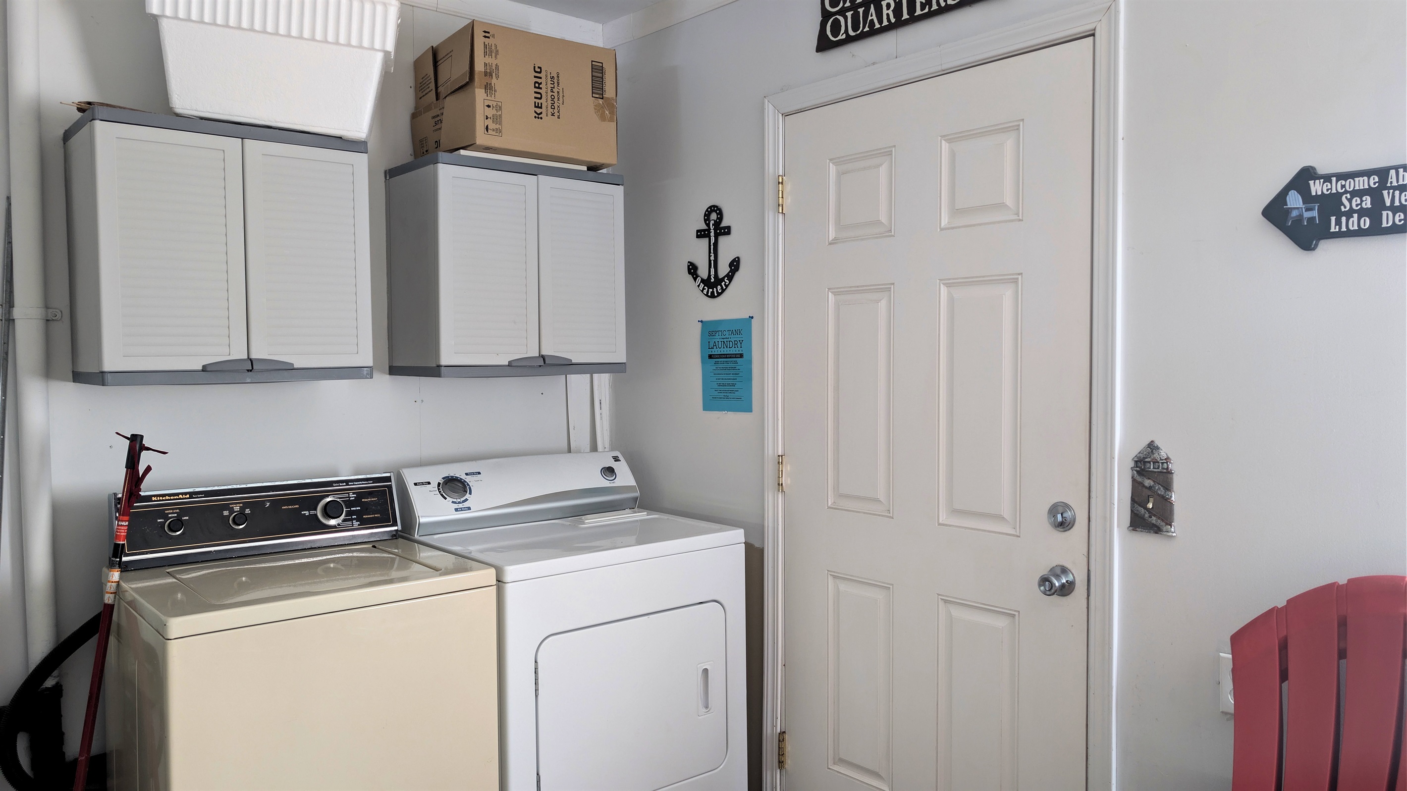 Laundry in Garage - door to back yard/deck