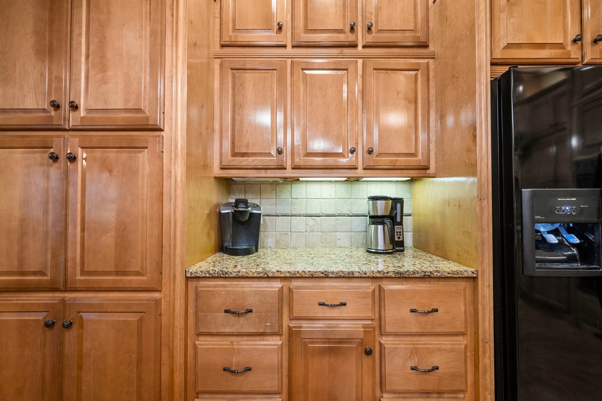 Coffee station and ample storage in this well-equipped kitchen.