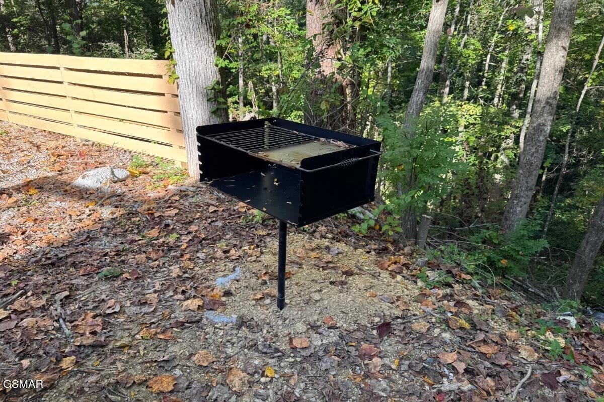 Enjoy a classic cookout. The grill is conveniently located near the fire pit for a full evening of outdoor fun and feasting.