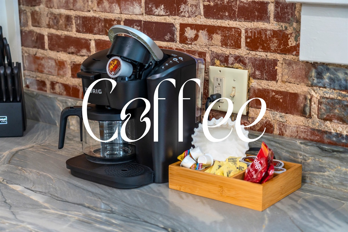 Start your mornings right with a coffee station that includes a sleek coffee maker and all the essentials for the perfect brew.