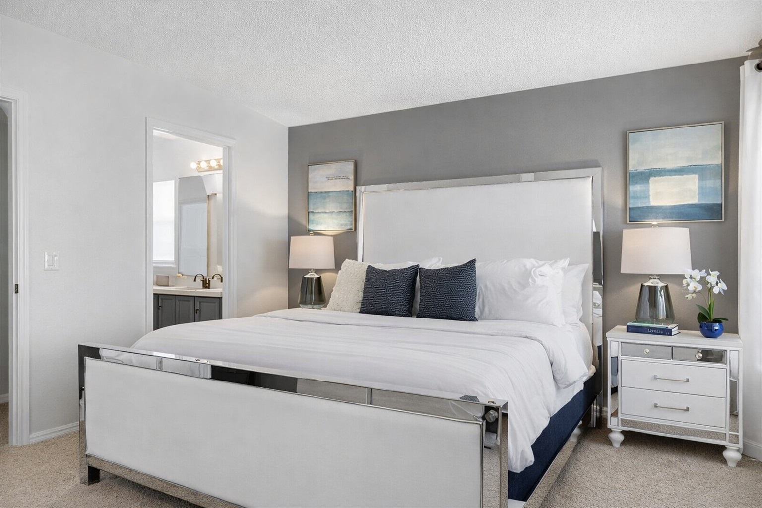 KING master bedroom with a pillowtop mattress, comfortable bedding  and soft lighting for a relaxing stay