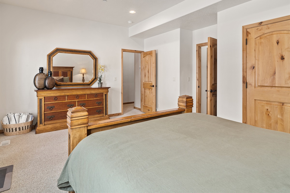 Bedroom with clean, cozy design and natural light