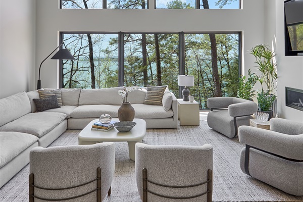 Natural light floods this spacious living area—perfect for unwinding with a book or catching up with friends.
