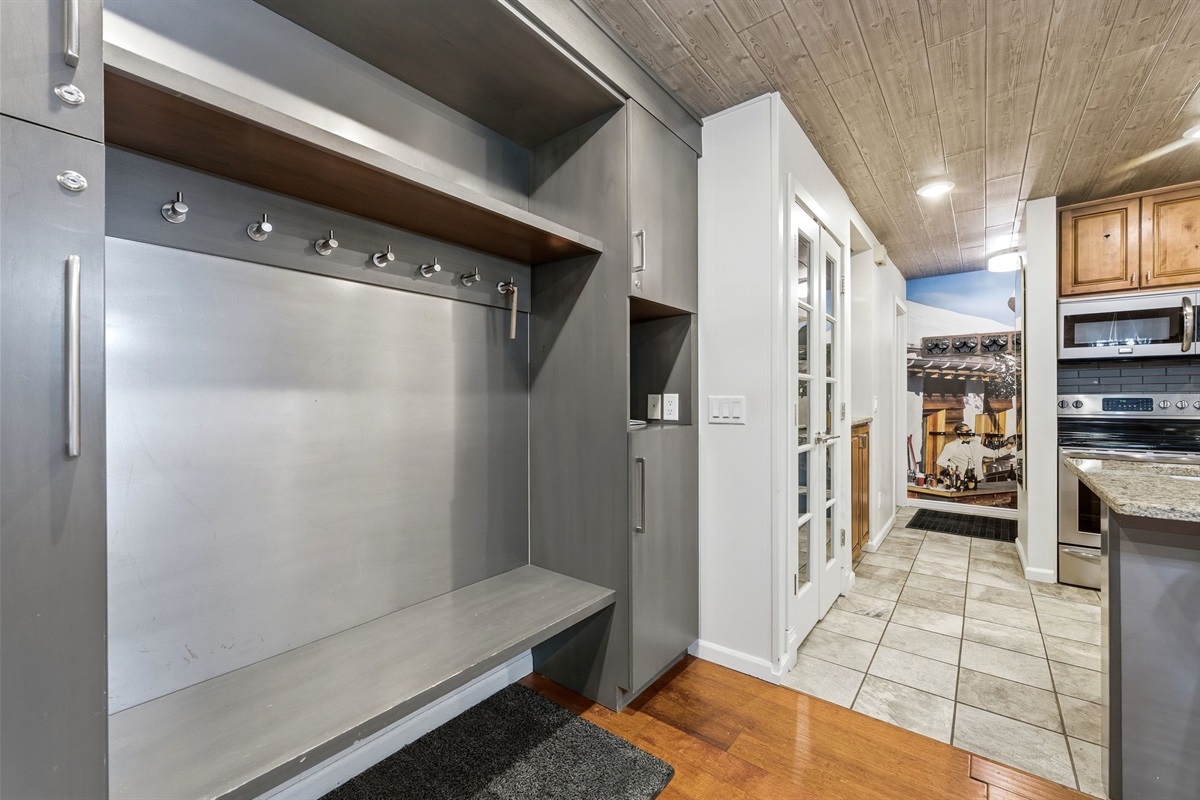 The storage by the table lets your crew come in, unload everything, and sit down together without all the chaos at your feet.