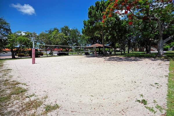 Sand volleyball courts and outdoor sports area directly across from the property at Floranada Park