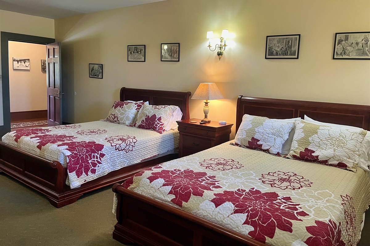 Guest room #5 with 2 queen size beds.