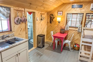 Kitchenette and bathroom door