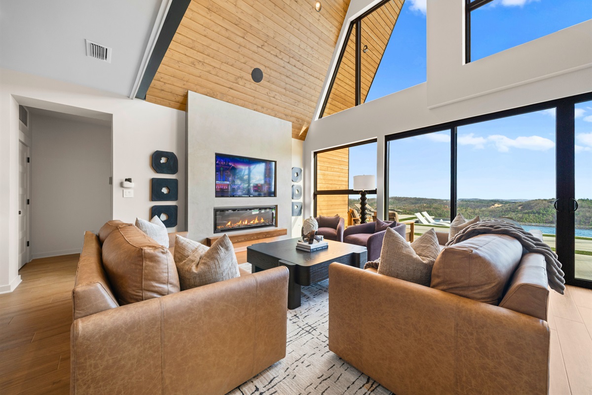 From this angle, you can really see how the living room is made for connection, with plenty of seating and a layout that keeps everyone gathered comfortably.