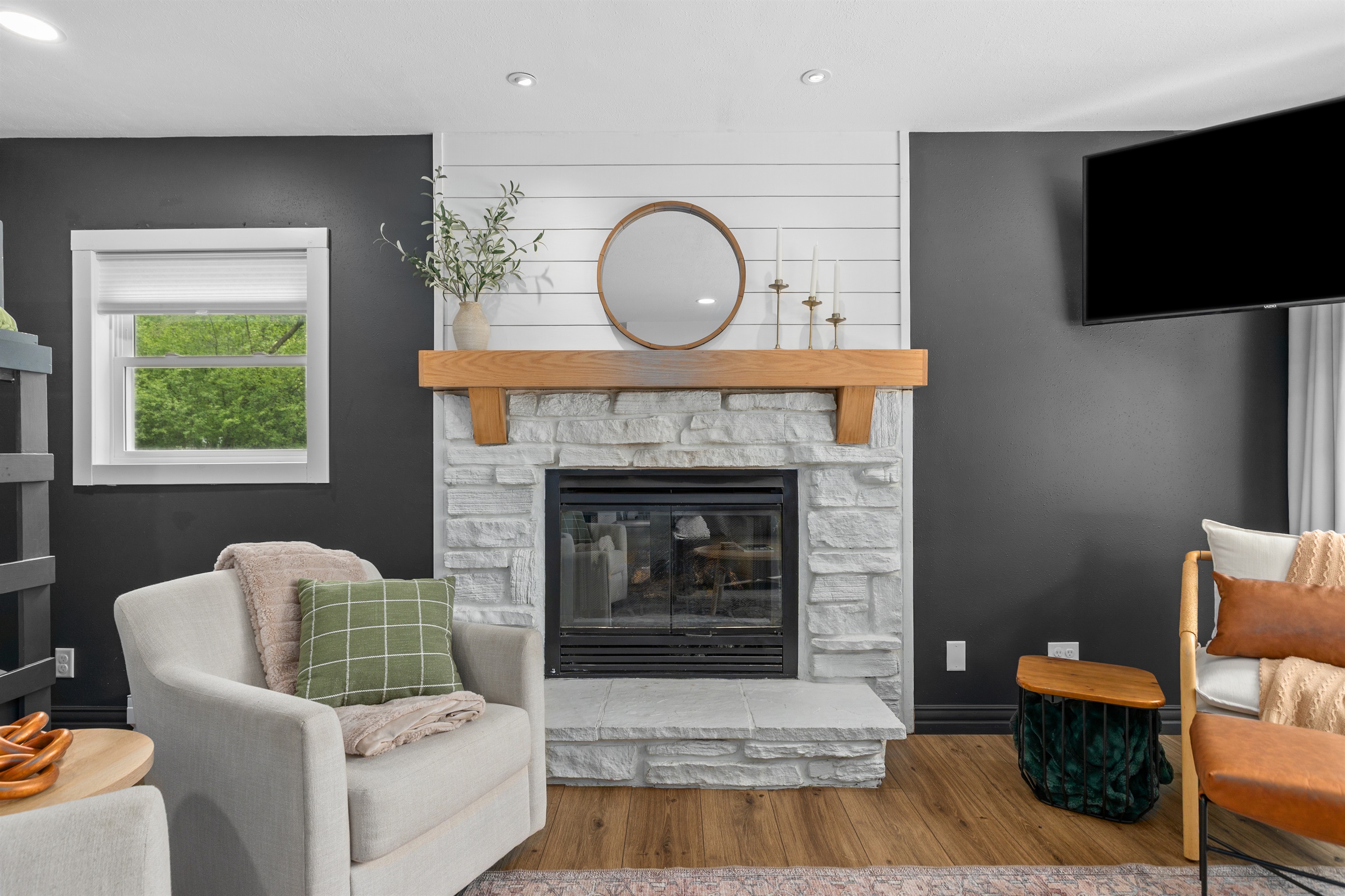 Cozy up by the gas fireplace and enjoy the warm, inviting atmosphere year-round.