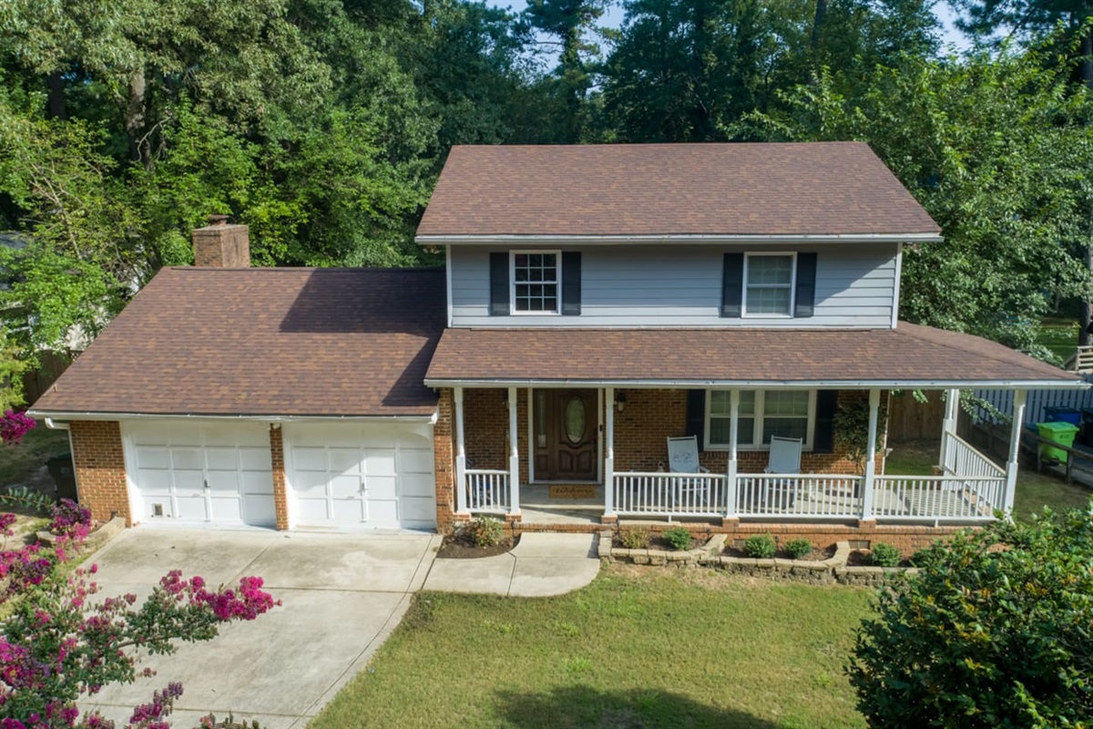 Welcome to your Raleigh vacation rental — a spacious two-story home with classic charm and a quiet setting.