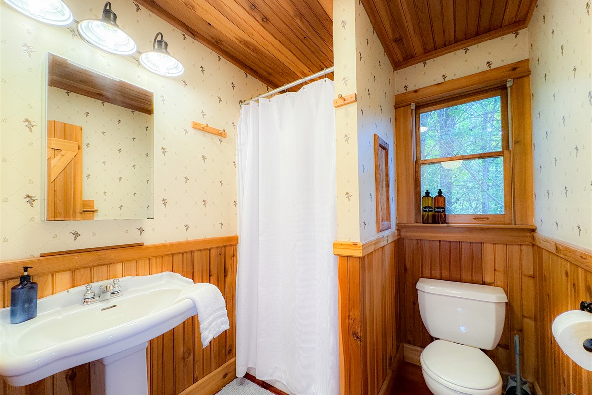 Full bathroom in the loft with a stall shower