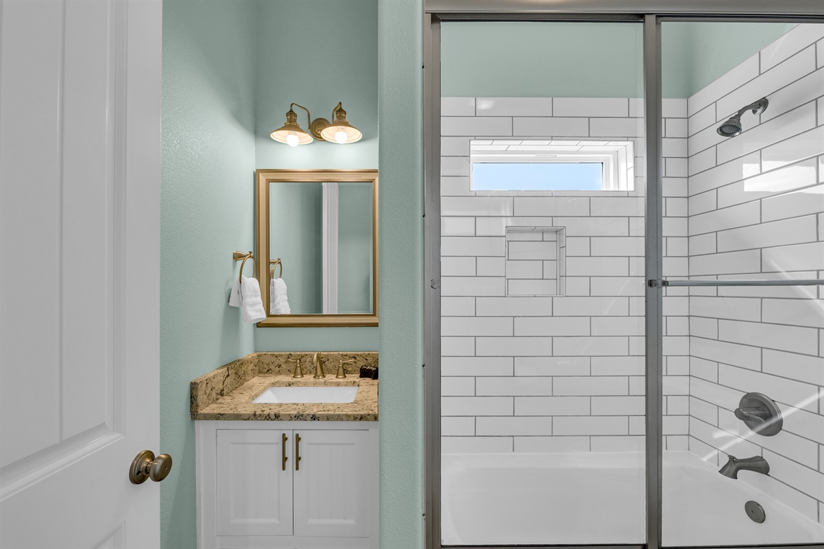 Sea It All: Guest bathroom services guests in the full over full bunk room, shower tub/combo and single vanity.
