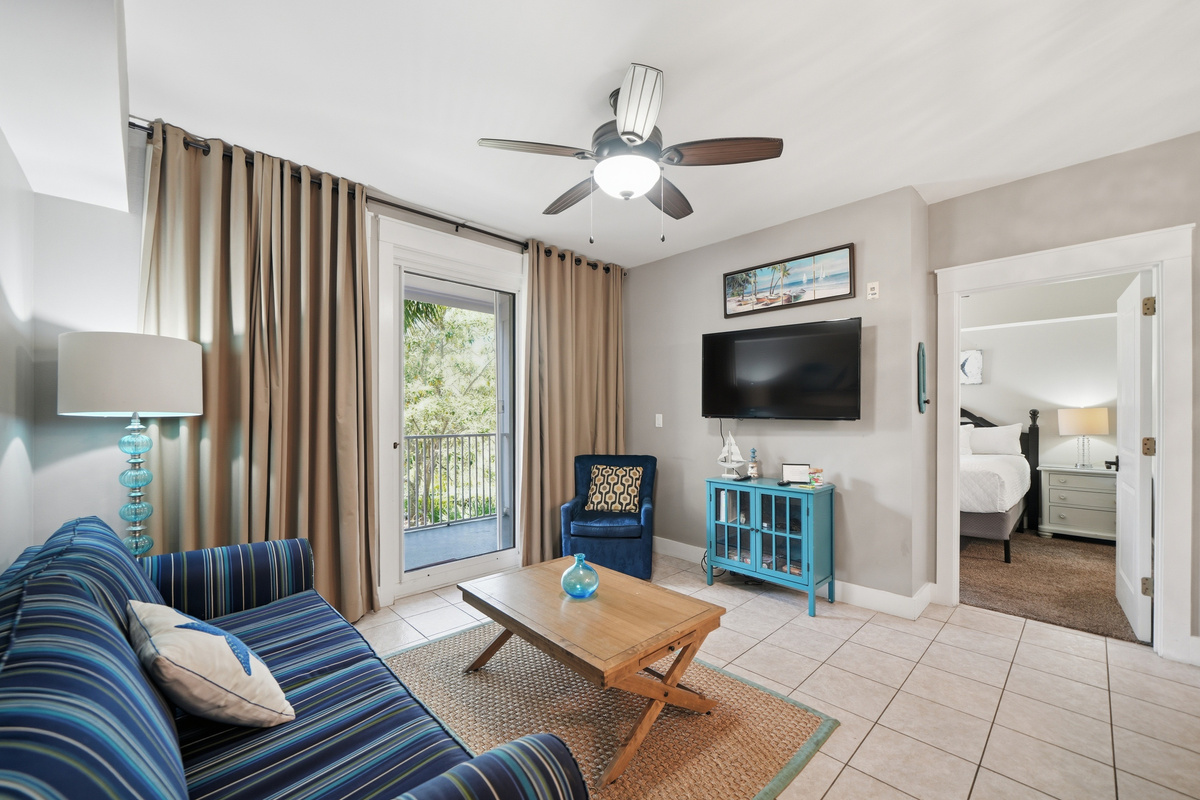 49'' mounted TV can be viewed from the living room & the kitchen w/ pool views!!