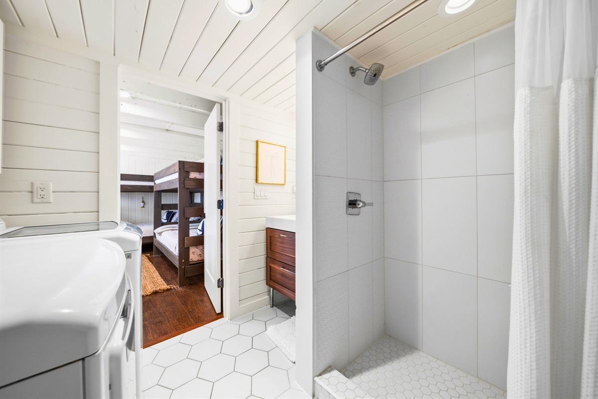 Move through the bathroom where the layout keeps everything easily accessible while maintaining a light and open feel.