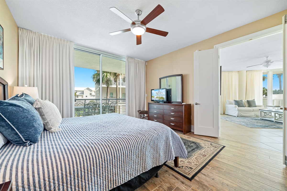 Step out onto your private balcony and enjoy the fresh sea air. This bedroom features a comfortable king-size bed and a flat-screen TV for your enjoyment.