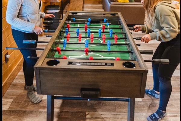 Lower Level Game Room with Foosball — Perfect for Friendly Competition.
