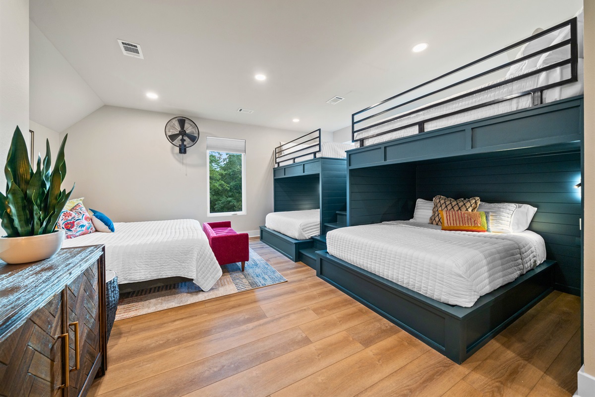 Cozy built-in bunk beds provide extra sleeping space, perfect for children or additional guests.