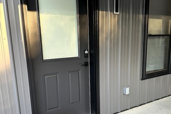 The front door has a keypad for self-check-in. The doorway is 36' wide for accessibility, and there are NO STEPS at this spacious shouse.