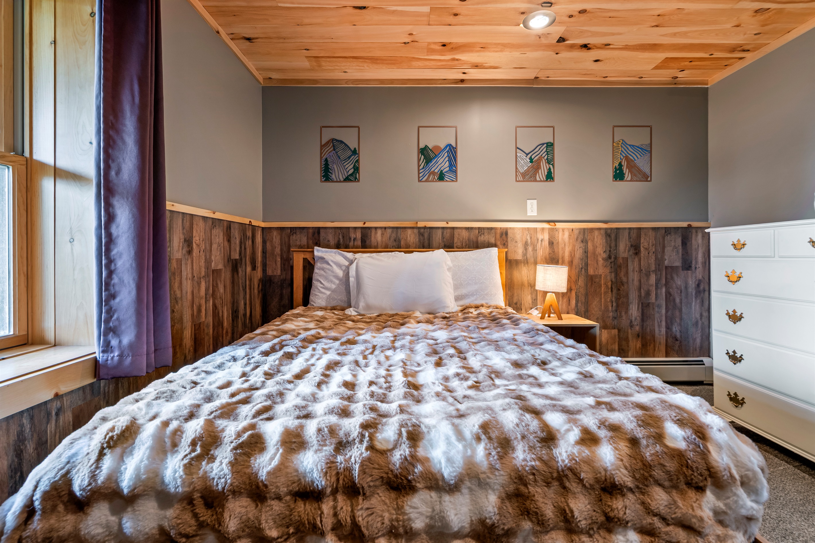 The third bedroom with queen bed is on the walk-out basement level