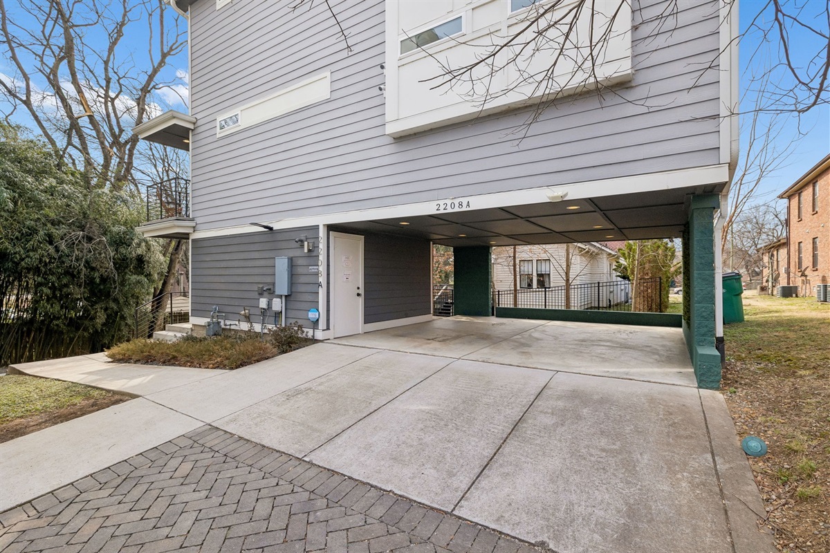 Carport entrance that can accommodate two standard size vehicles