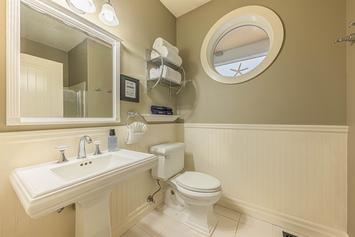 2nd bathroom on main floor with walk in shower.