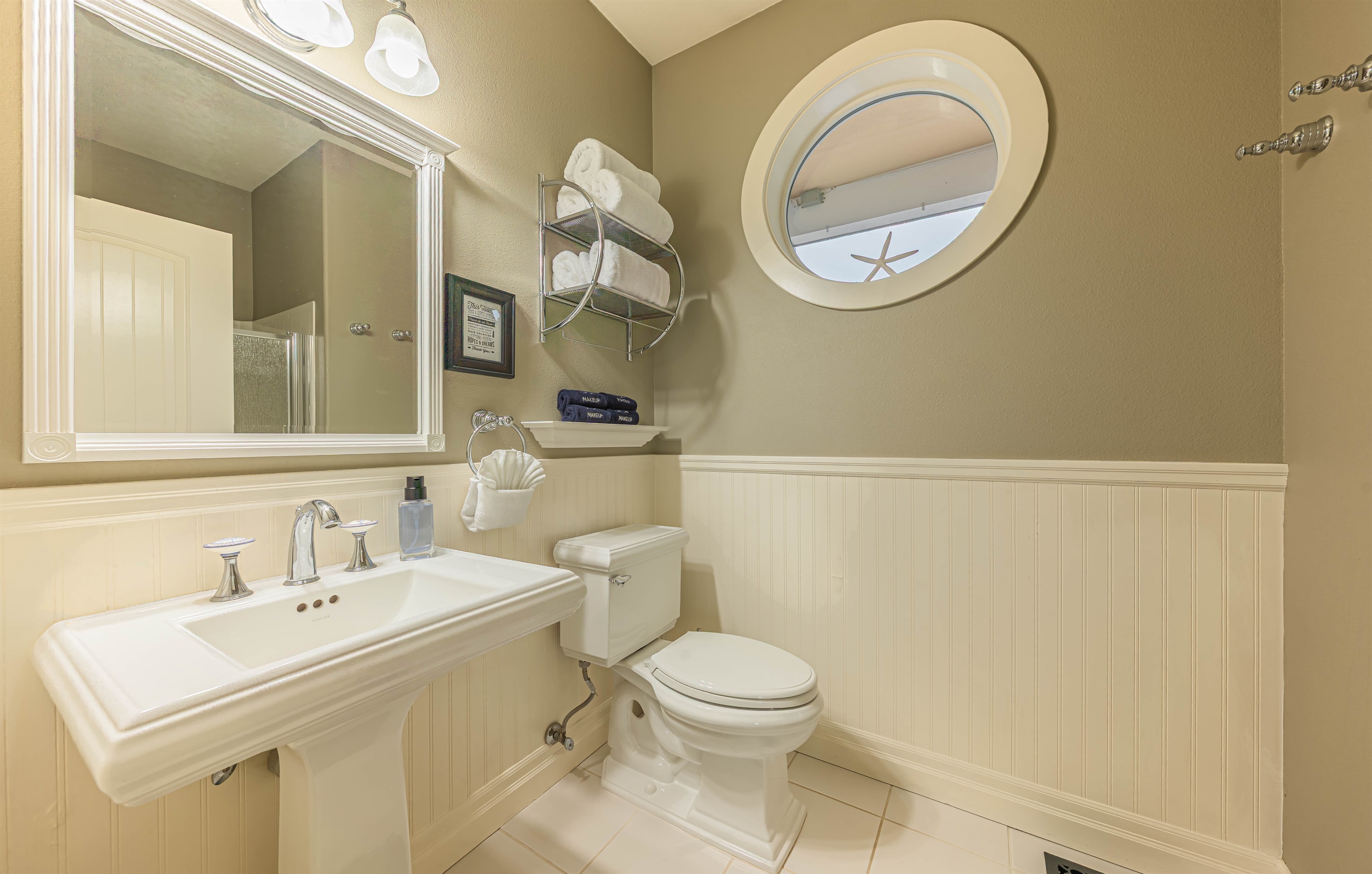 2nd bathroom on main floor with walk in shower.