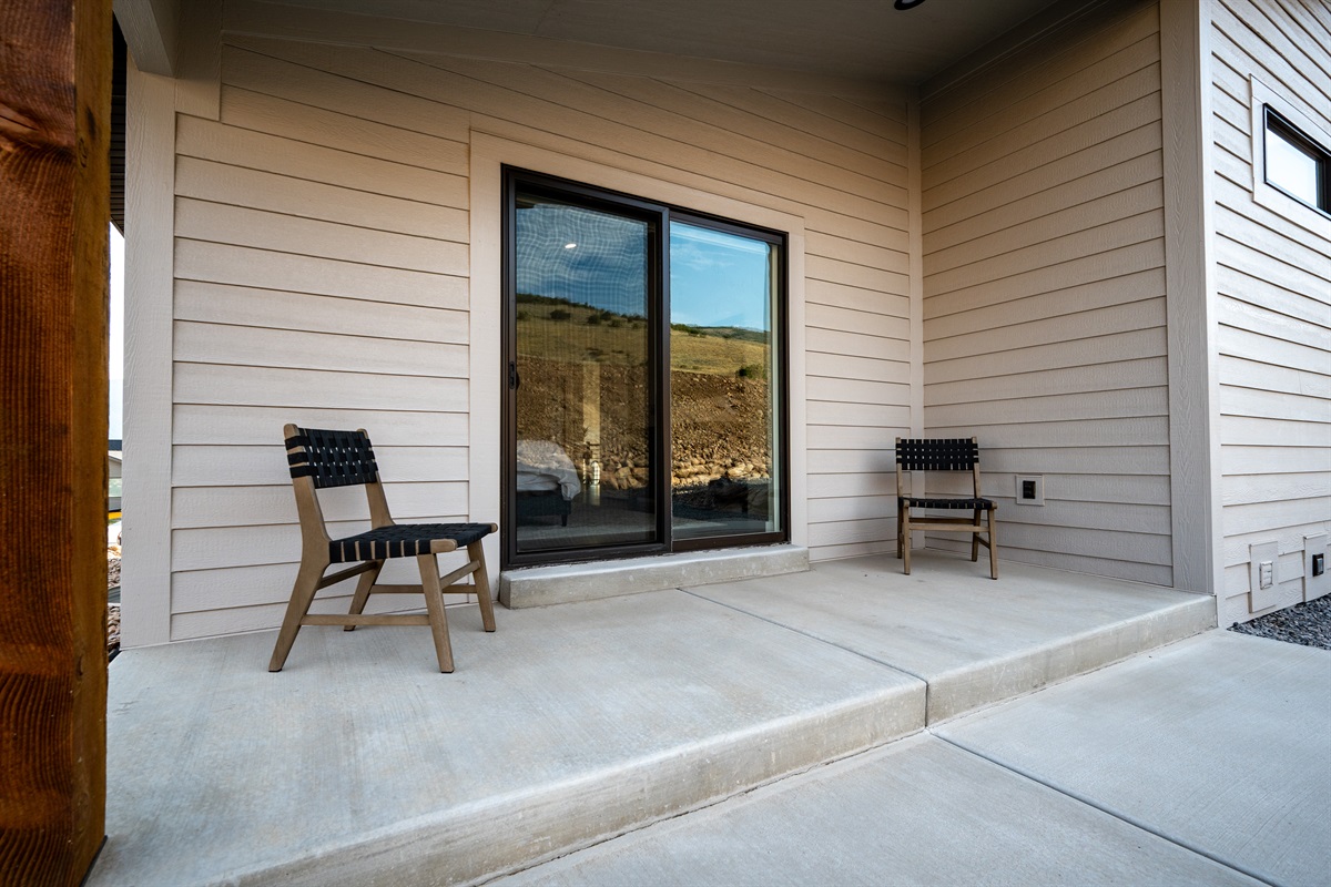Patio off the bedroom with seating for two—perfect for savoring morning coffee or evening wine.