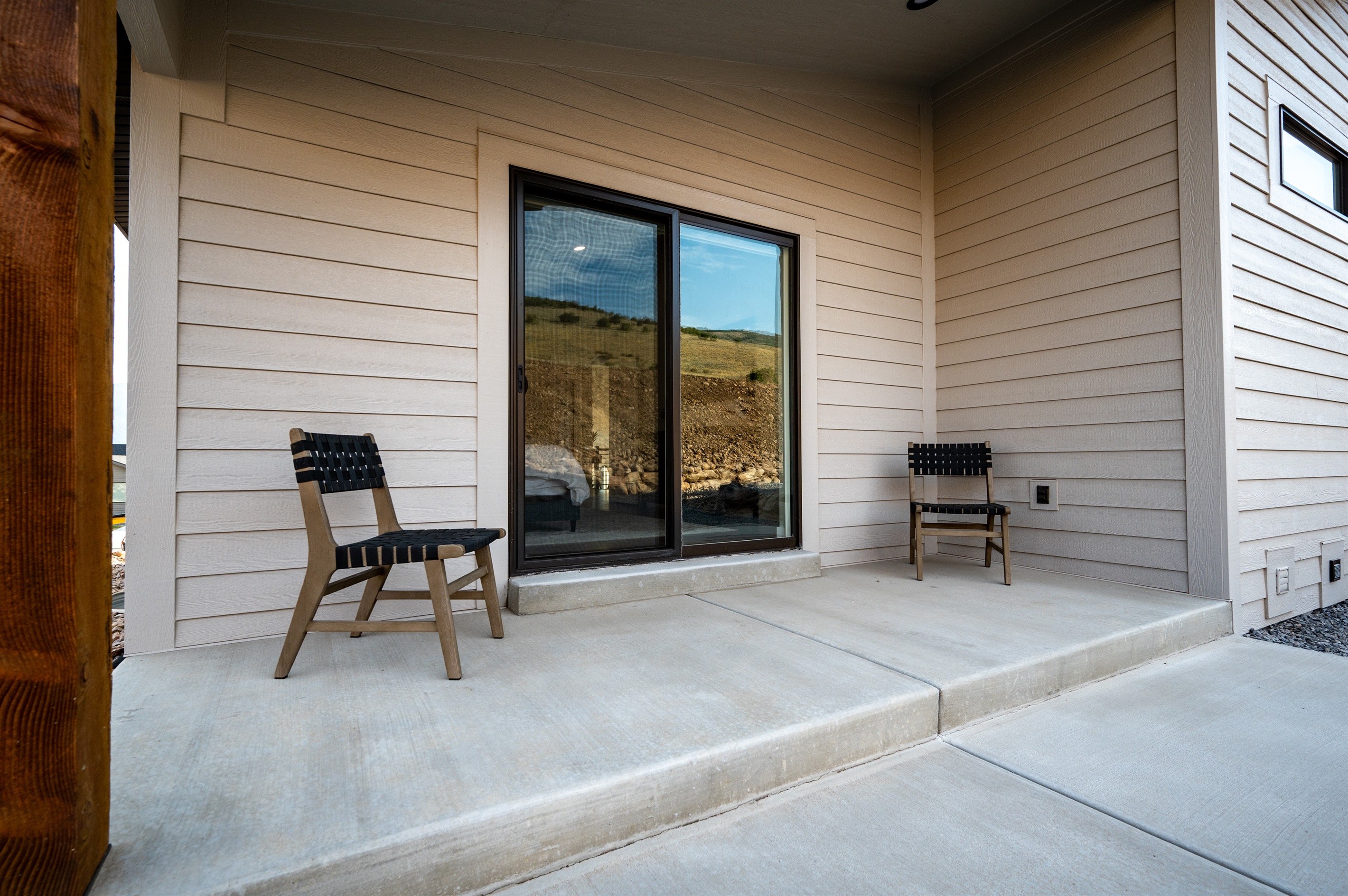 Patio off the bedroom with seating for two—perfect for savoring morning coffee or evening wine.