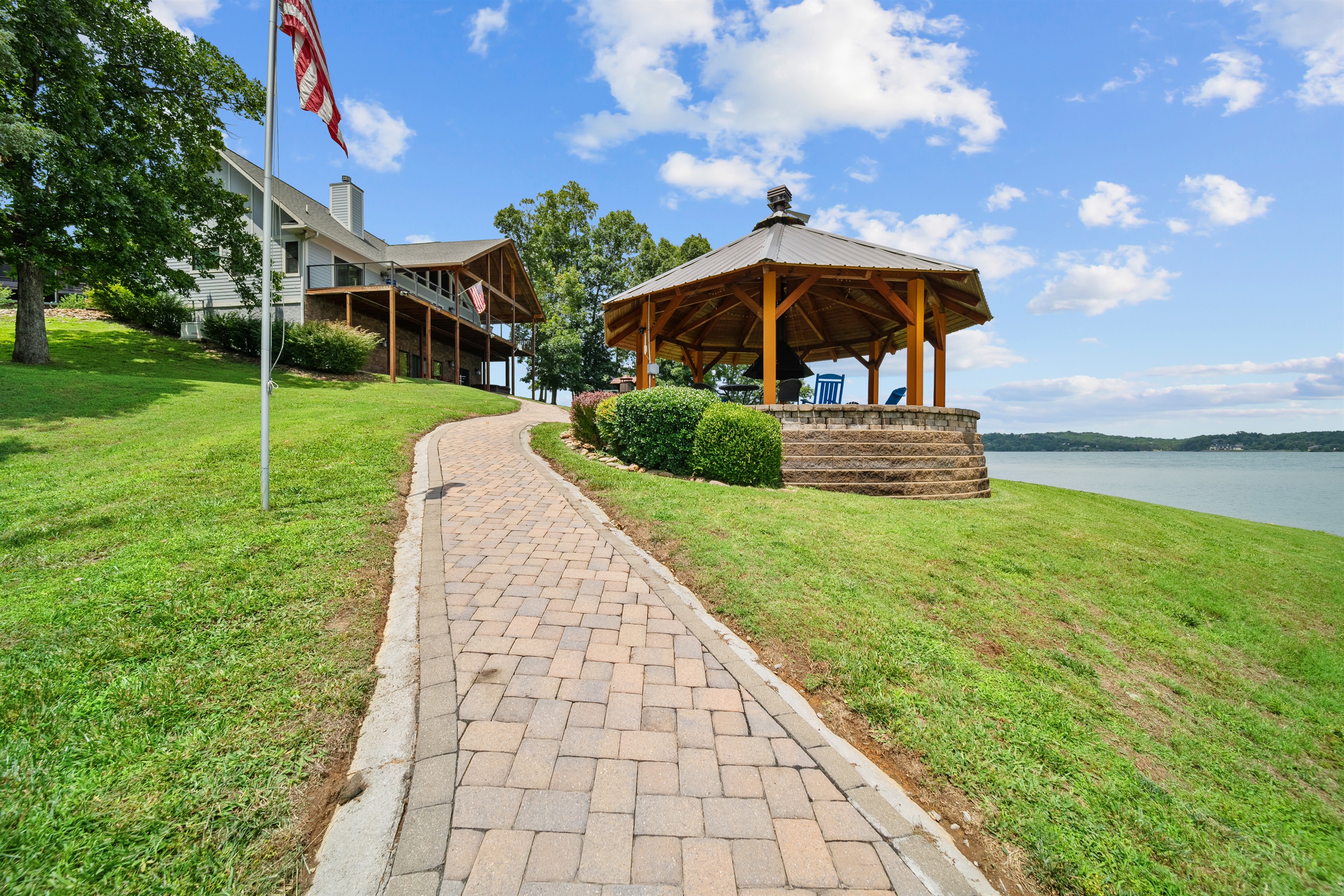 Shaded Sitting Area & Fire Pit right on the lake