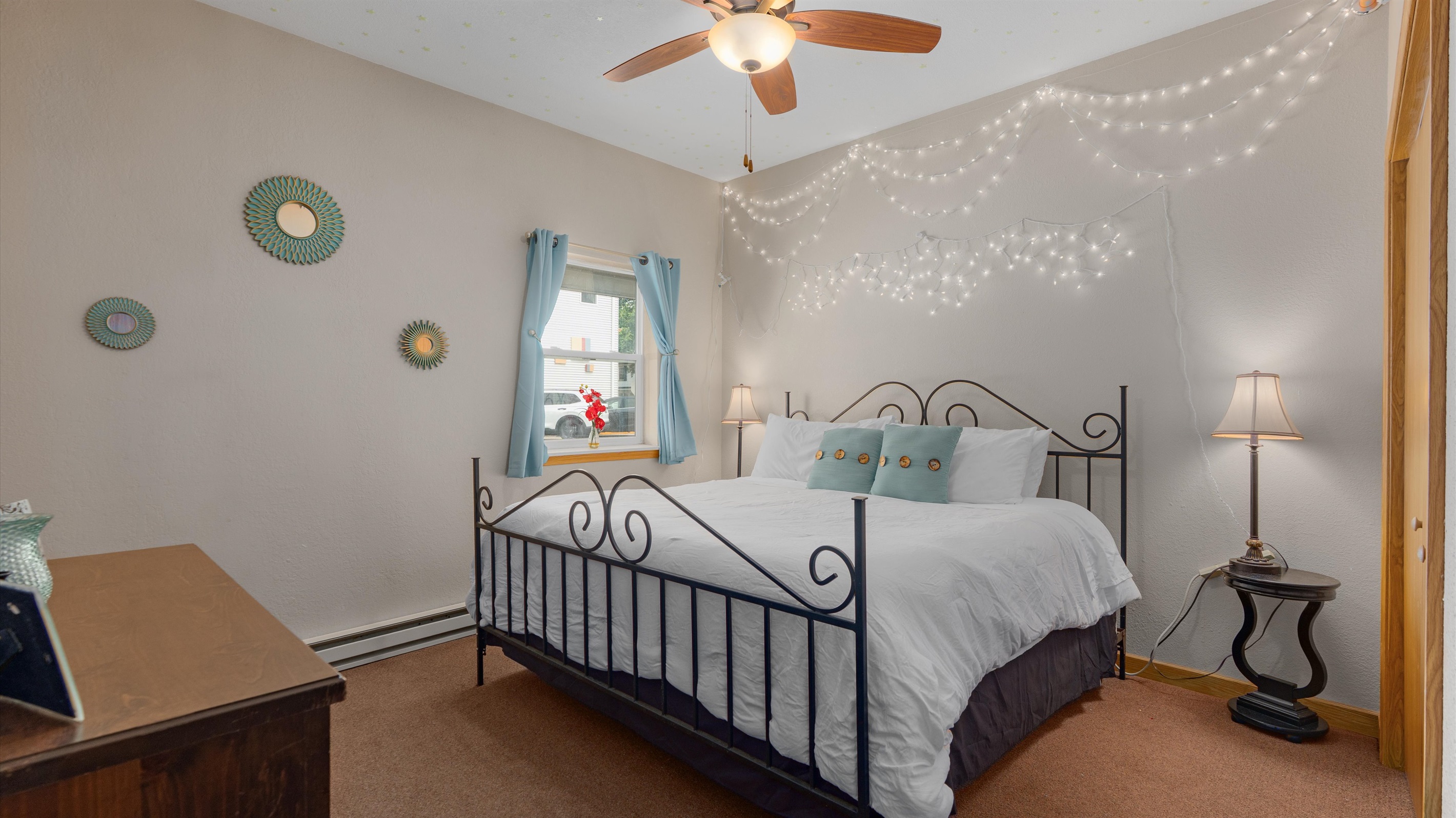 Starshine offers a comfortable king bed and subtle glowing stars overhead!