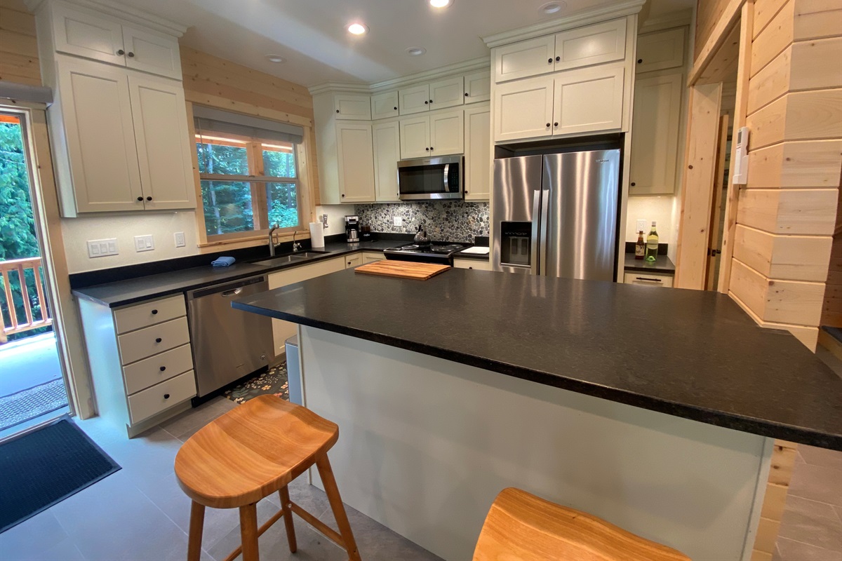 Full Chef inspired and stocked kitchen with state of the art brand new Whirlpool appliances.