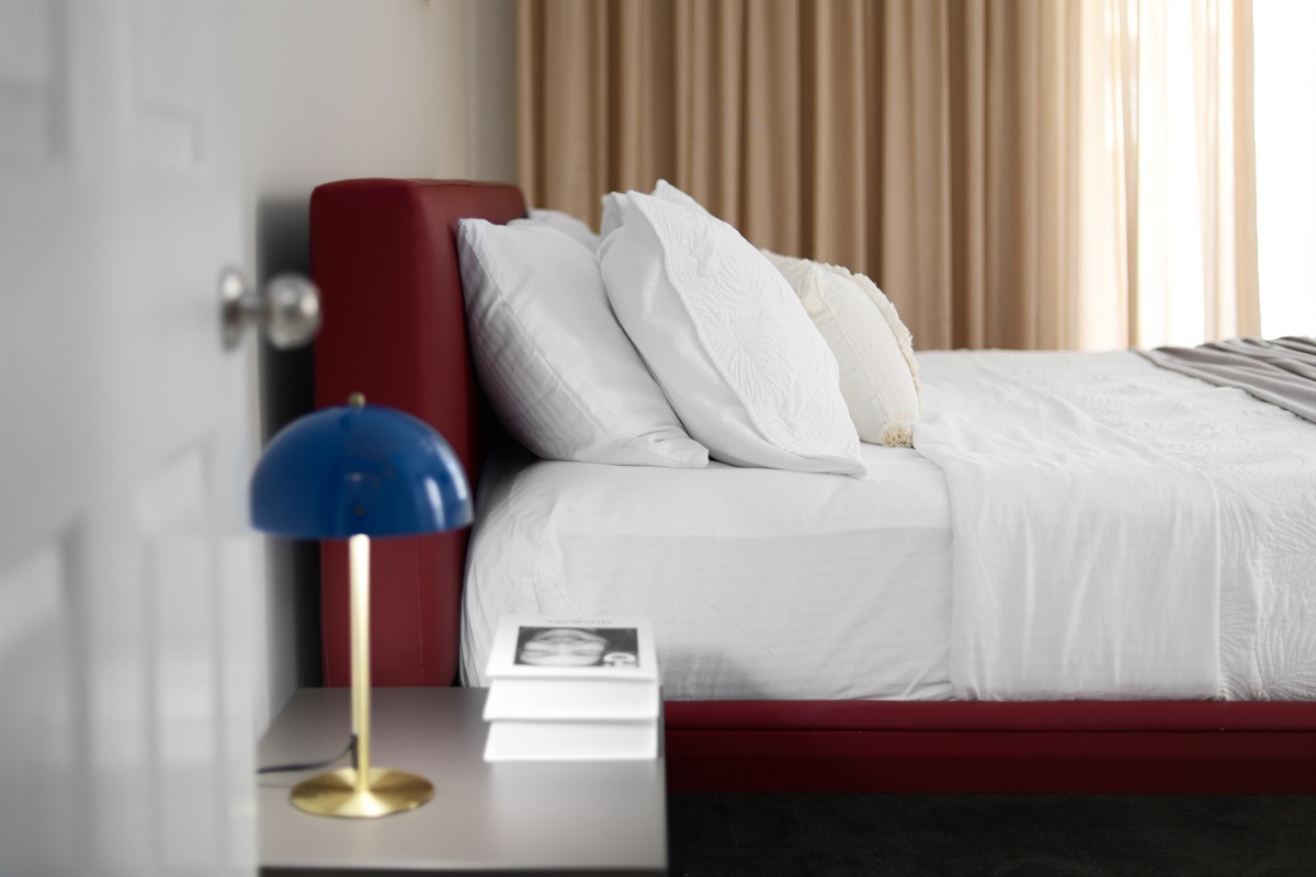 Bedroom 3 (1st Floor): KING Bed, Patio Access, Smart TV, Bathroom with Remodeled Walk-in Shower in Hallway - shared with Bedroom 2 (Sleeps 2)