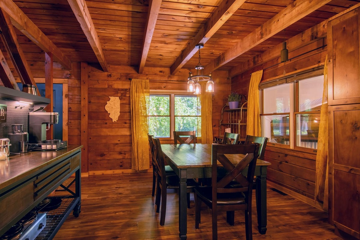 Table seats 6 people. This dining area has a pantry cabinet for your personal items.