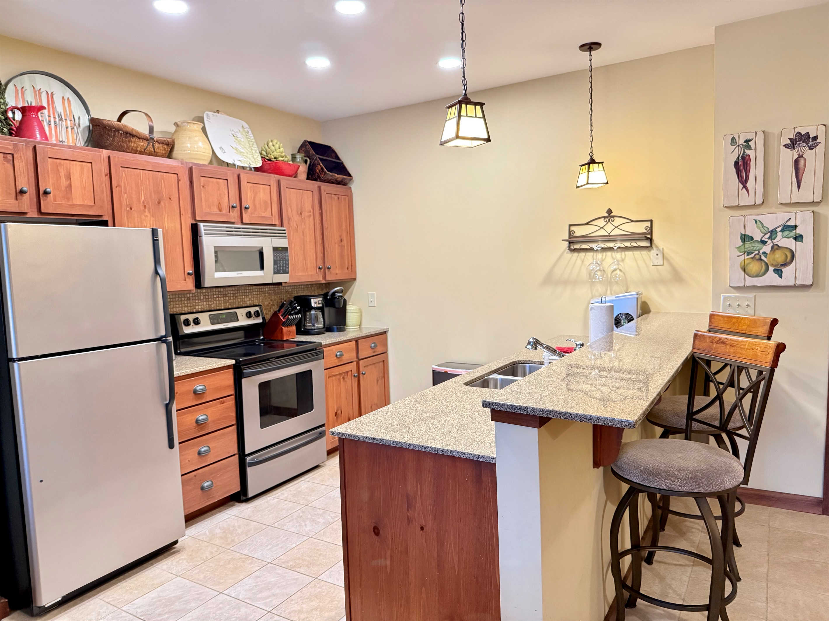 Full kitchen and bar seating