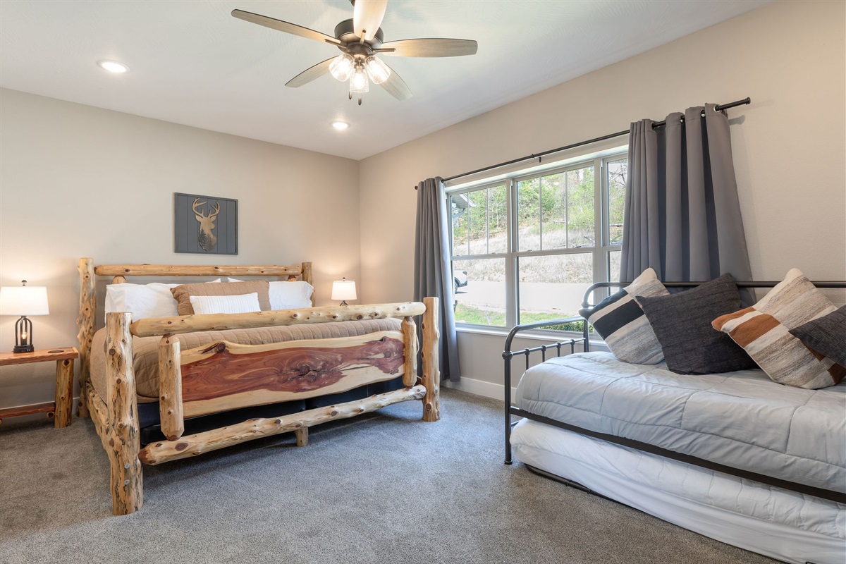 Main level King bedroom #4 w/ ensuite and trundle bed