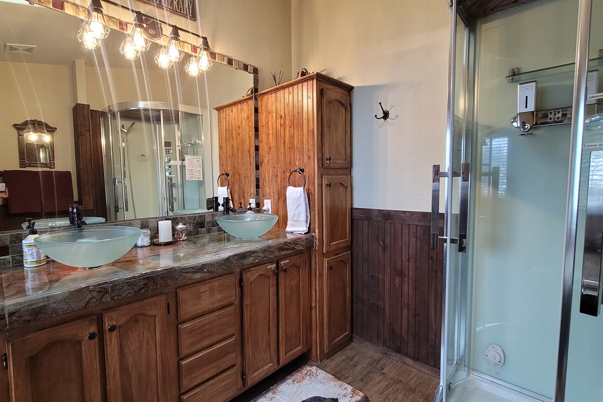 MBA with Steam shower with LED chromatherapy and stereo in the Master Suite, double sinks