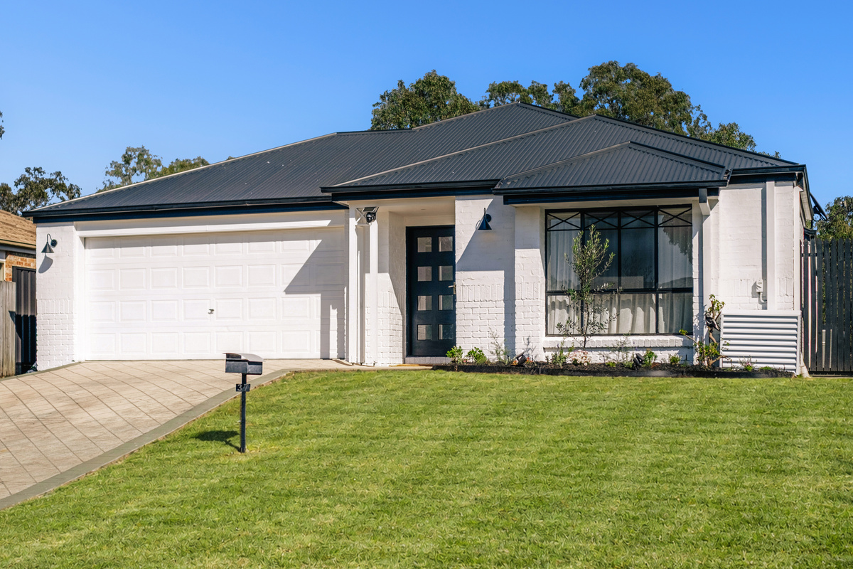 A warm welcome awaits from the moment you arrive, with a modern exterior, manicured lawn and convenient off-street access.