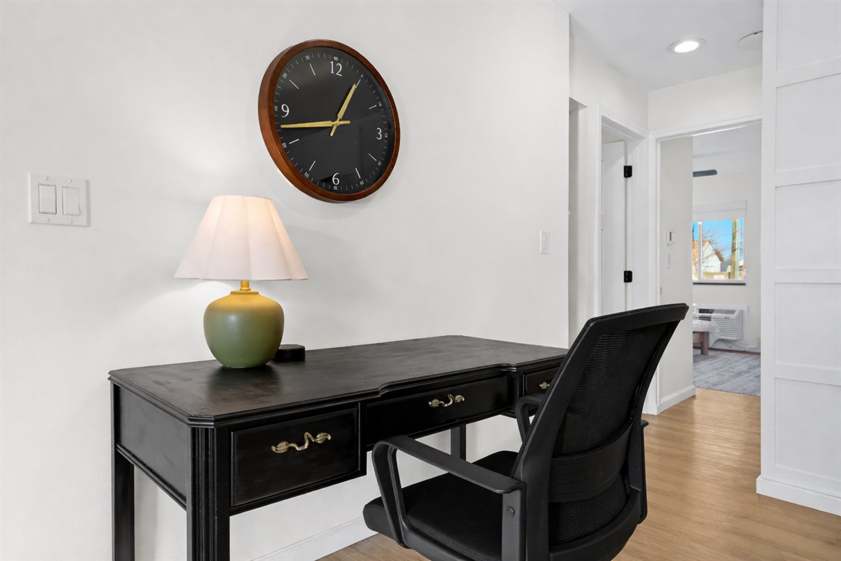 Stay productive at this dedicated workspace featuring a comfortable desk, task lighting, and a quiet setting—ideal for remote work or planning your day.