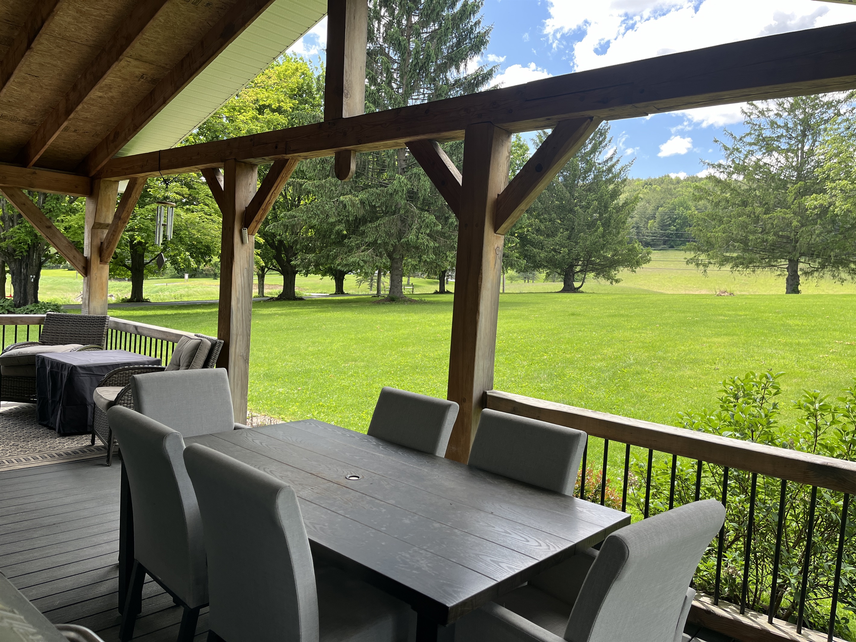 Outdoor dining on the Timberframe porch