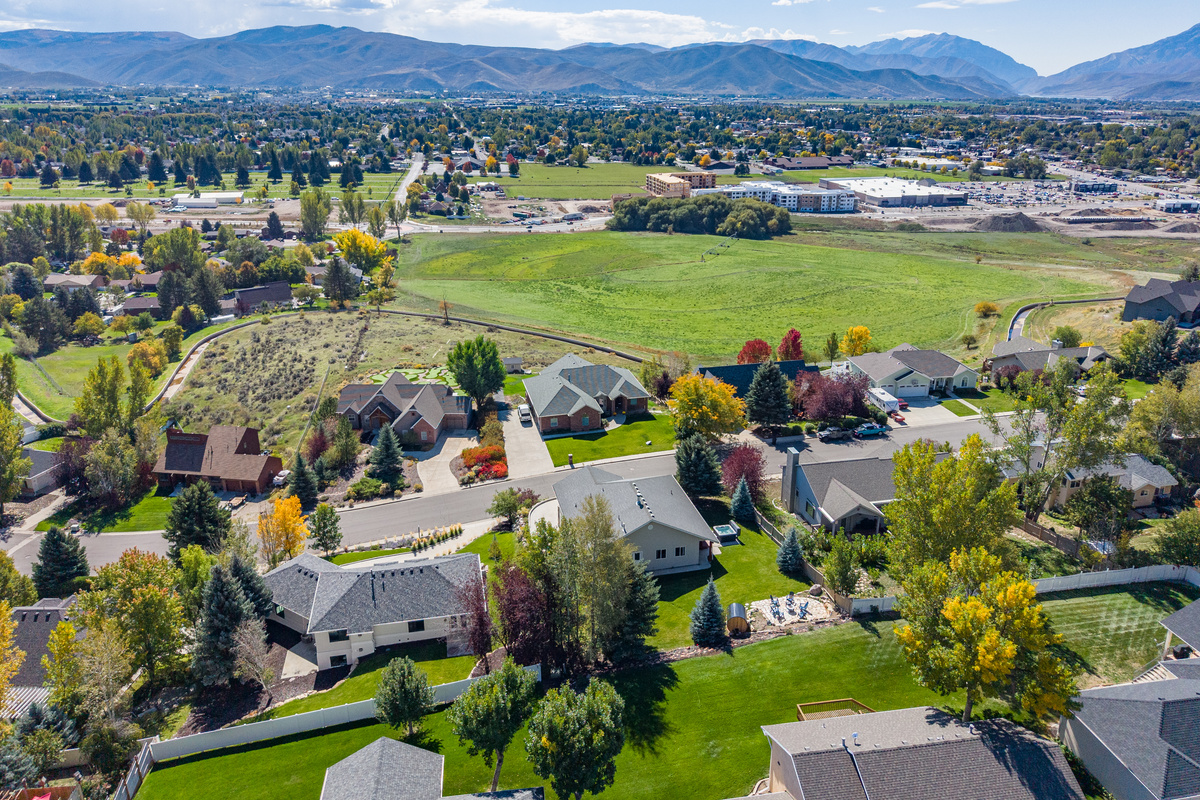 Views over the farmers fields to the Wasatch mountains. It's the perfect location to be close to a quiet neighborhood yet far enough away from the noise and bustle of Park City