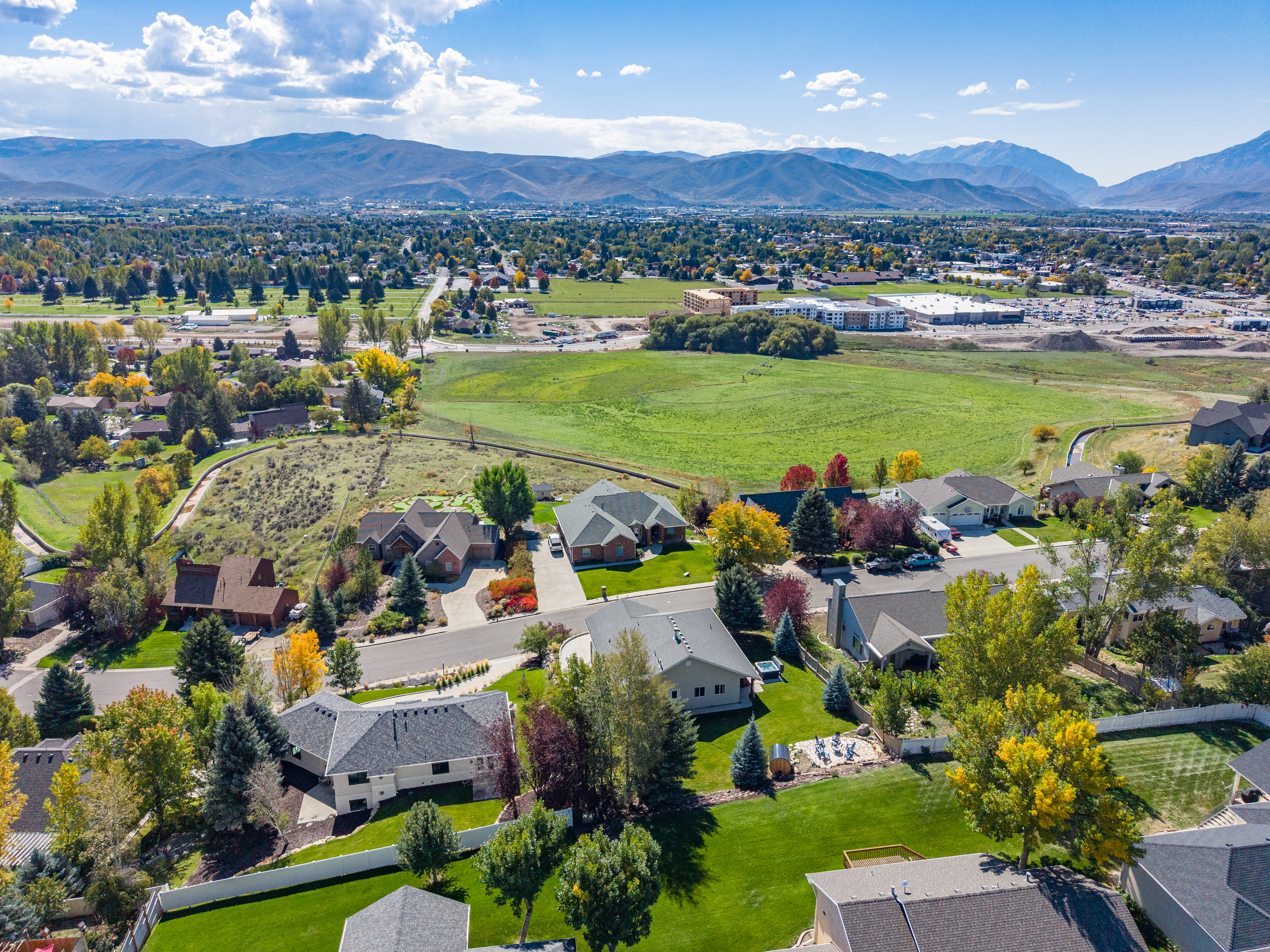 Views over the farmers fields to the Wasatch mountains. It's the perfect location to be close to a quiet neighborhood yet far enough away from the noise and bustle of Park City