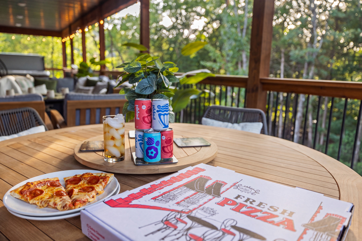 Pizza and cold drinks at the deck table - dinner with a view.