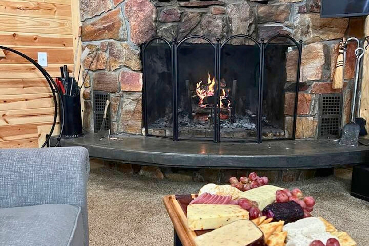 Fireplace is a great focal point in the great room. (Firewood is not provided)