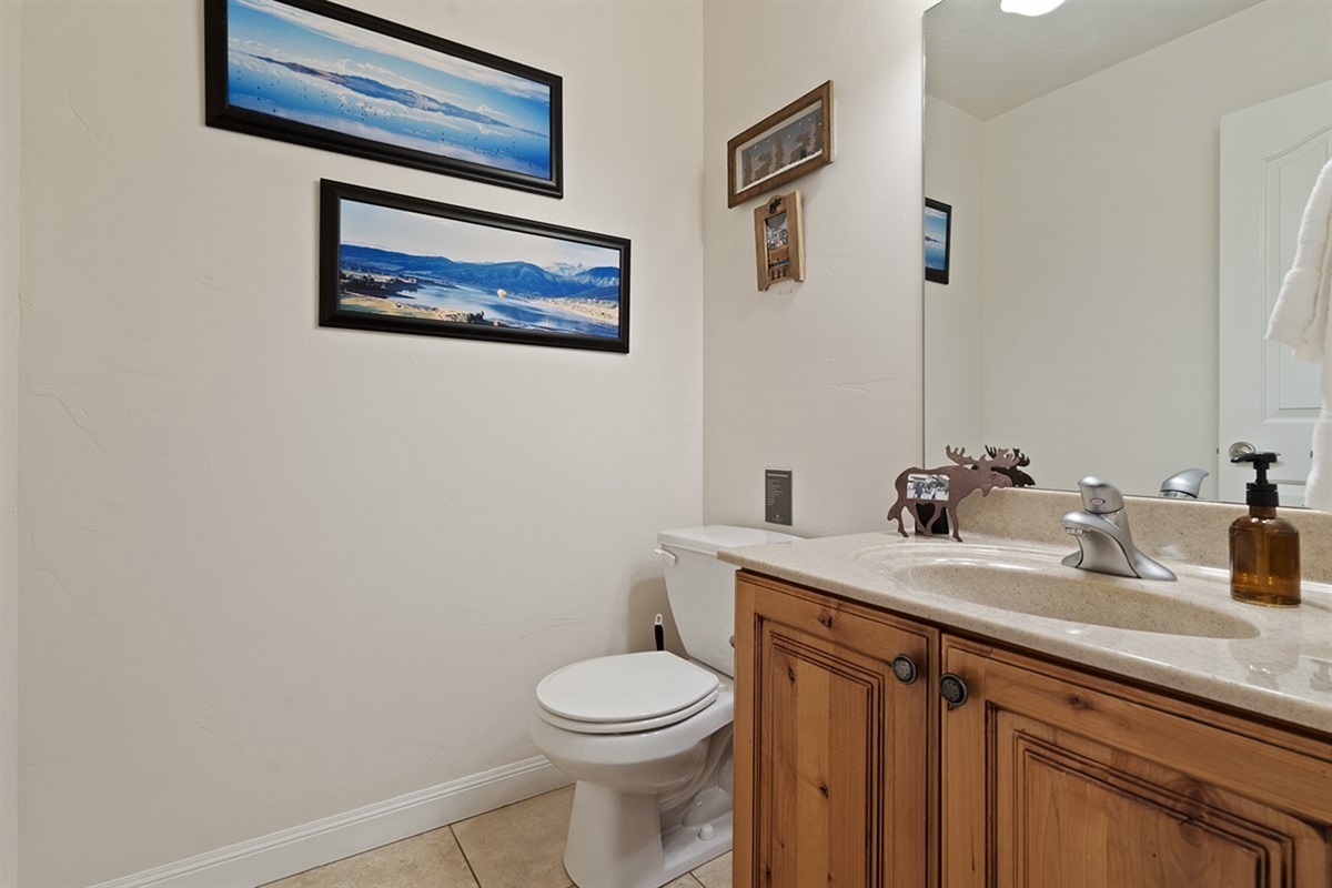 Main-level bathroom for guests and easy access.