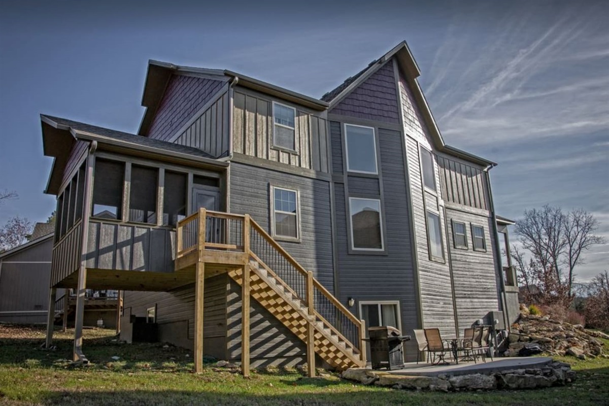 Big Screened in Deck that leads to lower level patio