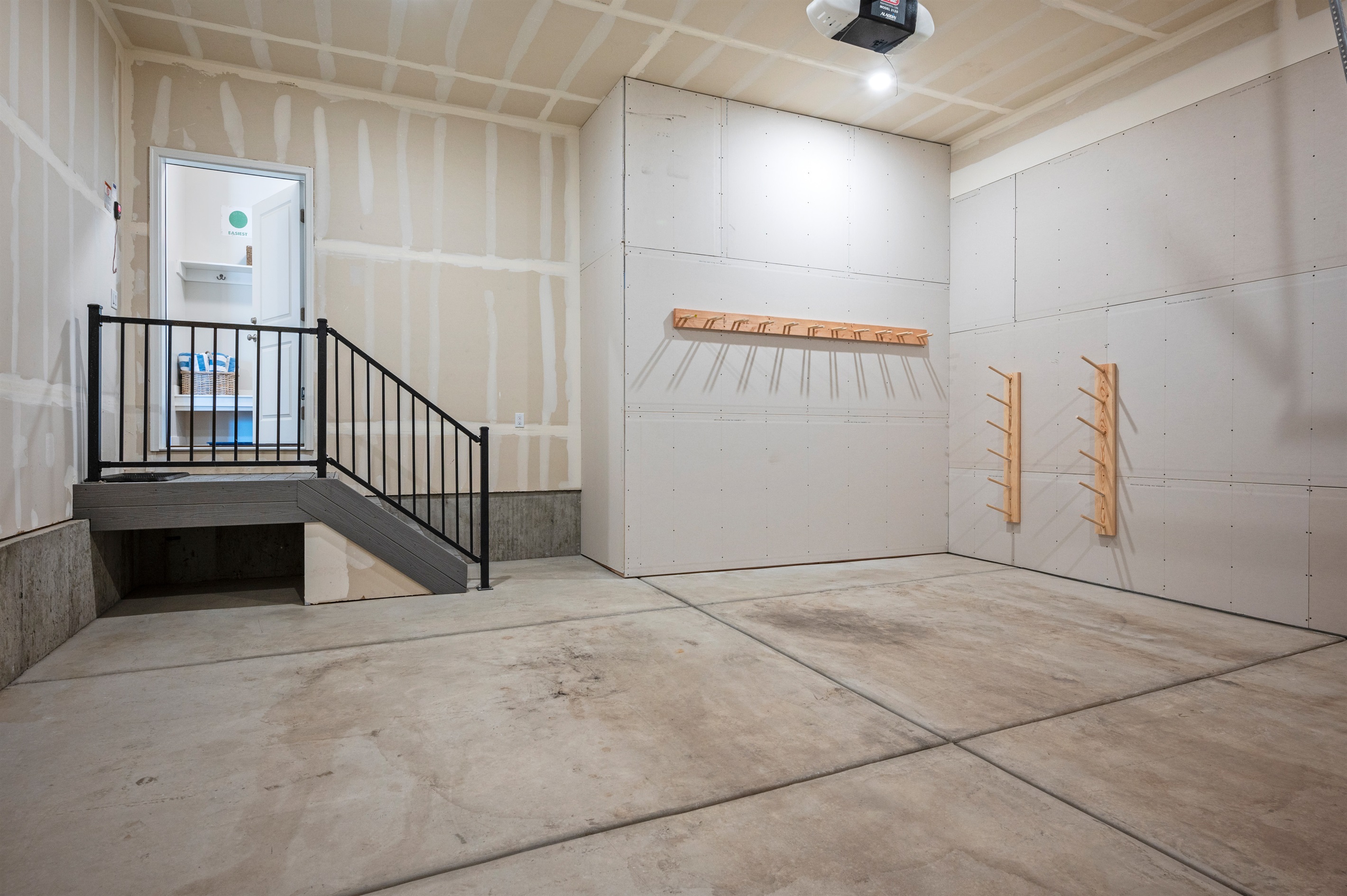 Store Your Gear with Ease – 2-Car Garage Featuring Ski & Snowboard Racks and Direct Mudroom Access