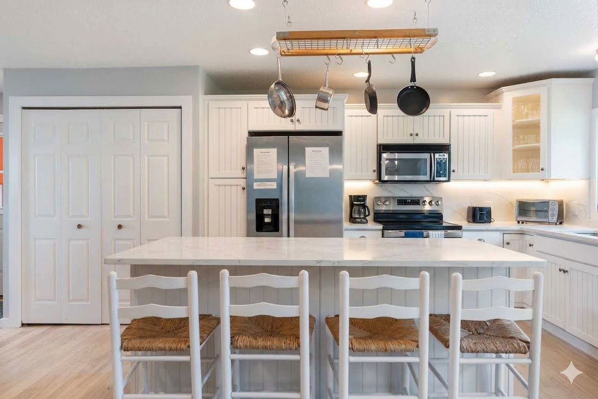 Large kitchen with new stone counters and under cabinet lighting