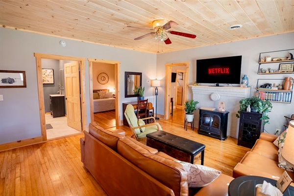 Comfortable family living room with plenty of seating, a smart TV —perfect for movie nights and relaxing together after a fun day in Pigeon Forge.