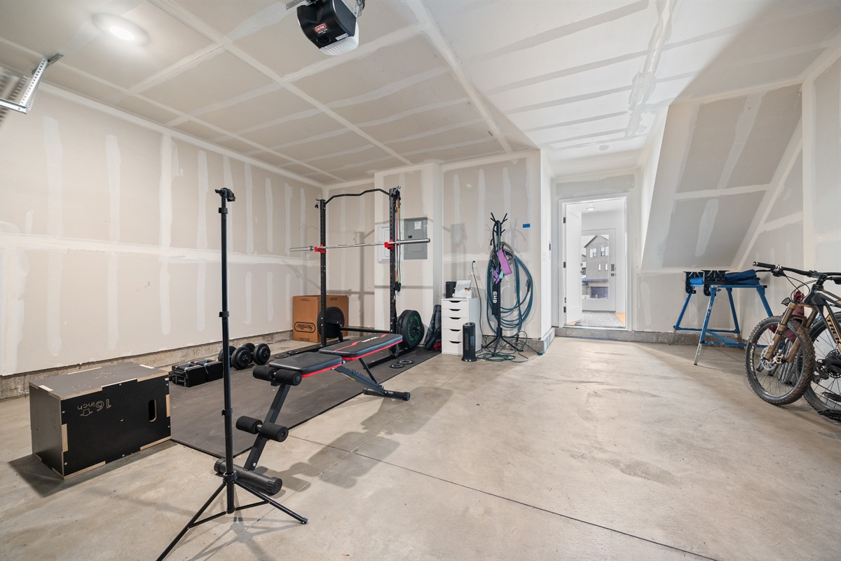 Spacious garage with room for gear, bikes, and more.