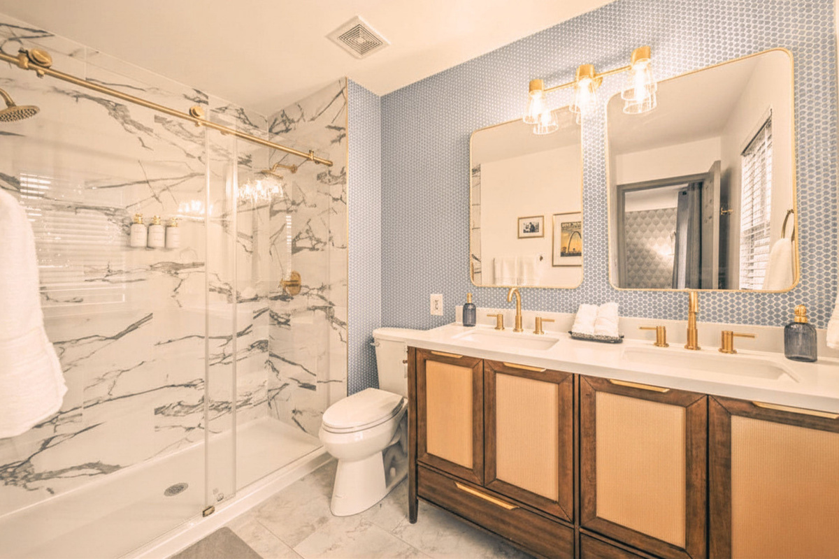 Spa-inspired ensuite featuring dual vanities and a luxury walk-in shower.